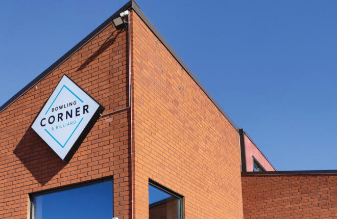 Bowling corner exterior signage on building