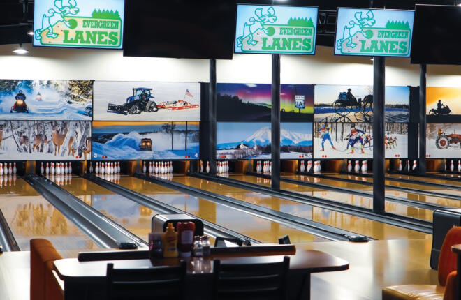 Brunswick bowling lanes with high top table seating, winterscape masking units