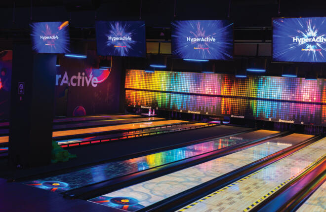 HyperActive bowling alley with digital screens and colorful Spark lanes