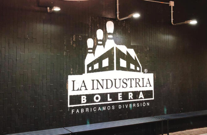 Wall graphics featuring La Industria's logo