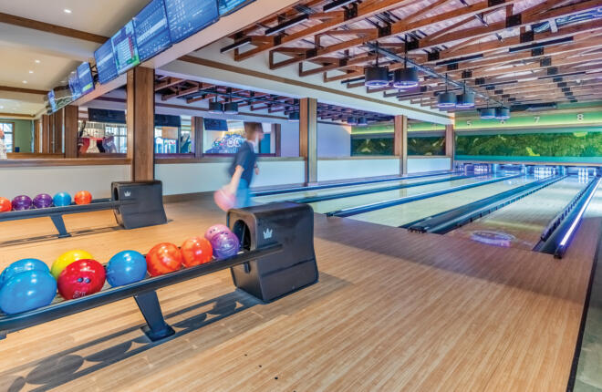 Brunswick bowling lanes at Night Heron Park Kiawah Island SC with wood accents and natural lighting through windows