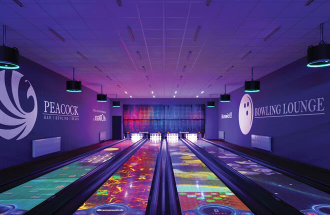 Lanes displaying Spark. Brunswicks augmented reality bowling experience