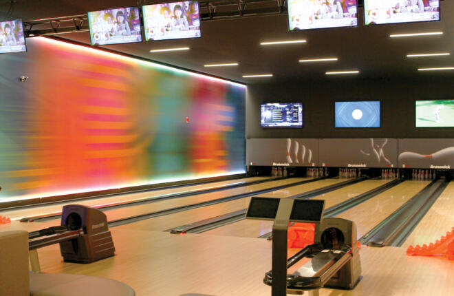Interior image of the bowling lanes and Center Stage Furniture