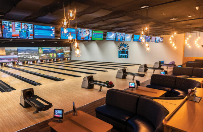 Image of the bowling lanes with Center Stage furniture and Sync Scoring