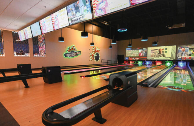 Brunswick bowling lanes with Spark projection on lanes, ball returns at lane end