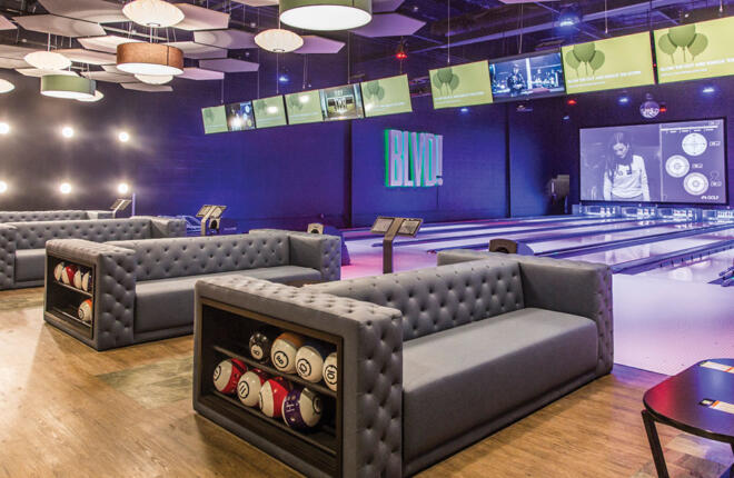 Bowlers area, seating with built in ball racks, lanes, Sync & ball returns