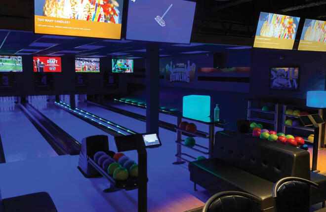 Interior image of bowling lane. Black lighting