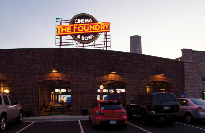 Exterior of the Foundry Cinema Bowl and neon building signage