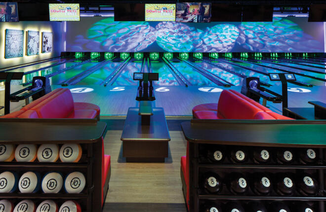 View from bowlers area, ball racks, seating, lanes, ball returns & Sync tablets