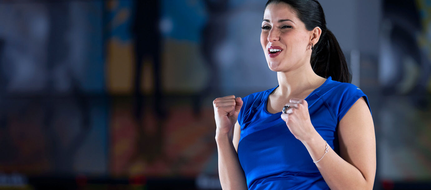 Pro Staffer Ashly Galante smiling with double fist pump