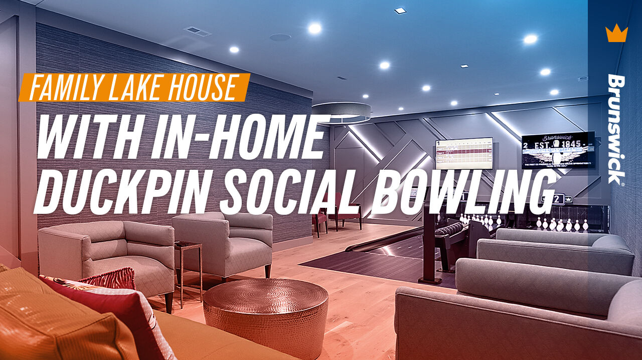 Promotional image showing a modern home entertainment room with two private Duckpin Social bowling lanes by Brunswick Bowling. Text overlay reads “Family Lake House with In-Home Duckpin Social Bowling” beside the Brunswick crown logo on a blue-to-orange gradient background.